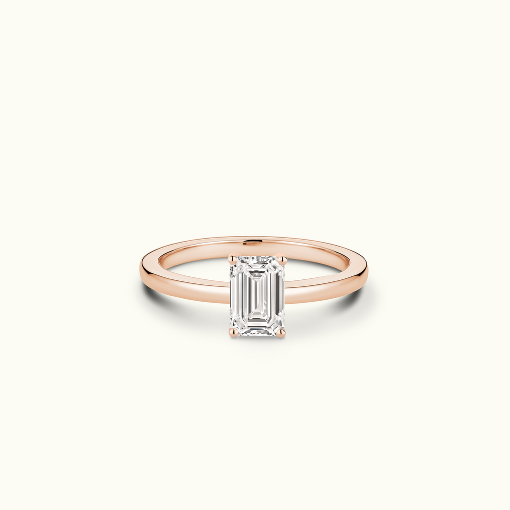 Jewellers District's Diamond Engagement Ring with Signature Knot-Basket and Diamond Prongs in 14k Rose Gold, Emerald