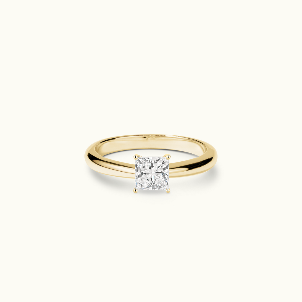 Jewellers District's Diamond Engagement Ring with Tapered Band in 14k Yellow Gold, Princess