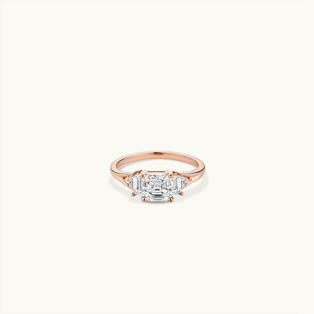 Jewellers District's Three-Stone Engagement ring with Cluster Side Diamonds in 14k Rose Gold, Asscher