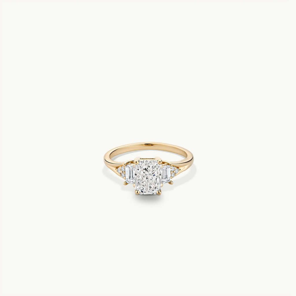 Jewellers District's Three-Stone Engagement ring with Cluster Side Diamonds in 14k Yellow Gold, Radiant