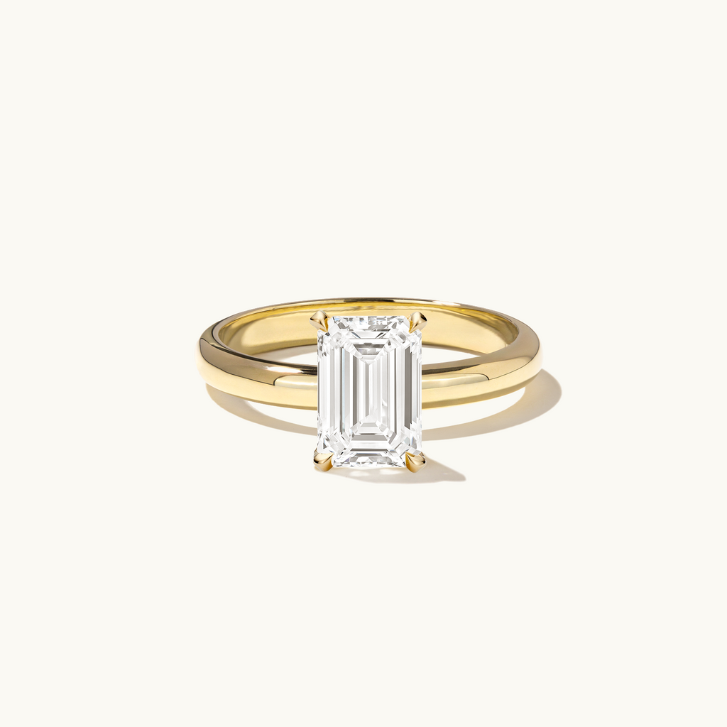 Jewellers District's Diamond Engagement Ring with Thick Band in 14k Yellow Gold, Emerald