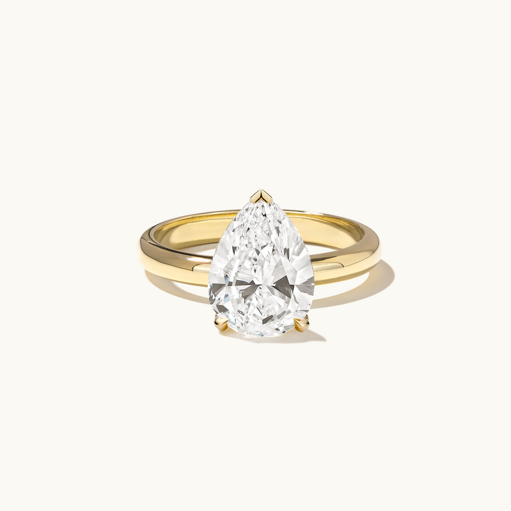 Jewellers District's Diamond Engagement Ring with Thick Band in 14k Yellow Gold, Pear