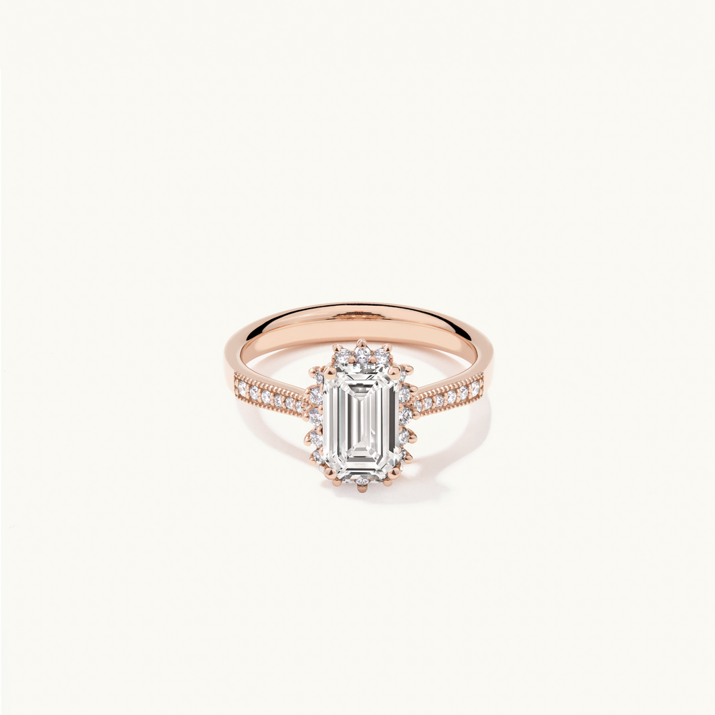 Jewellers District's Diamond Halo Engagement Ring with Milgrain in 14k Rose Gold, Emerald