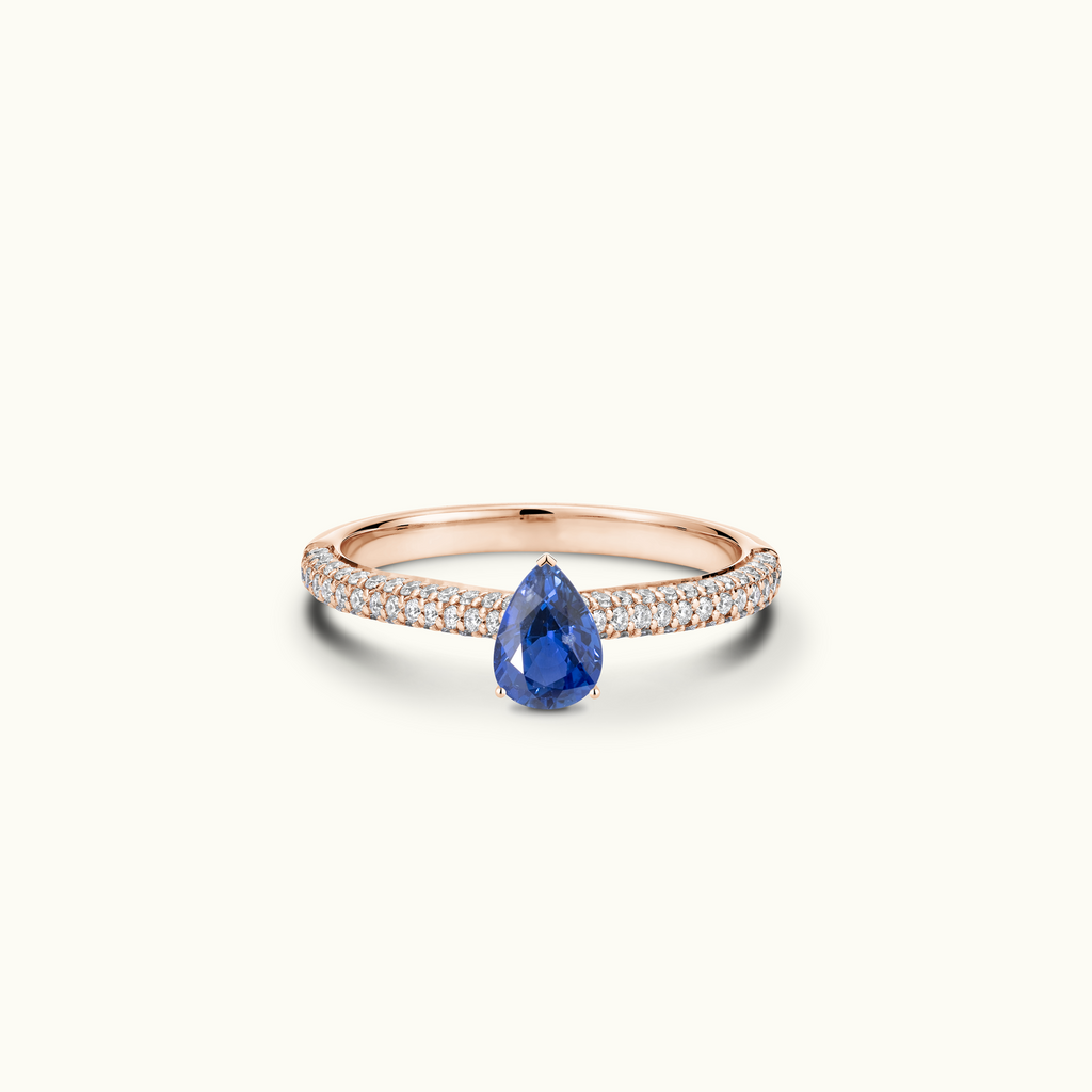 Jewellers District's Royal Sapphire Engagement Ring with Signature Knot-Basket and Micropavé Band in 14k Rose Gold, Pear