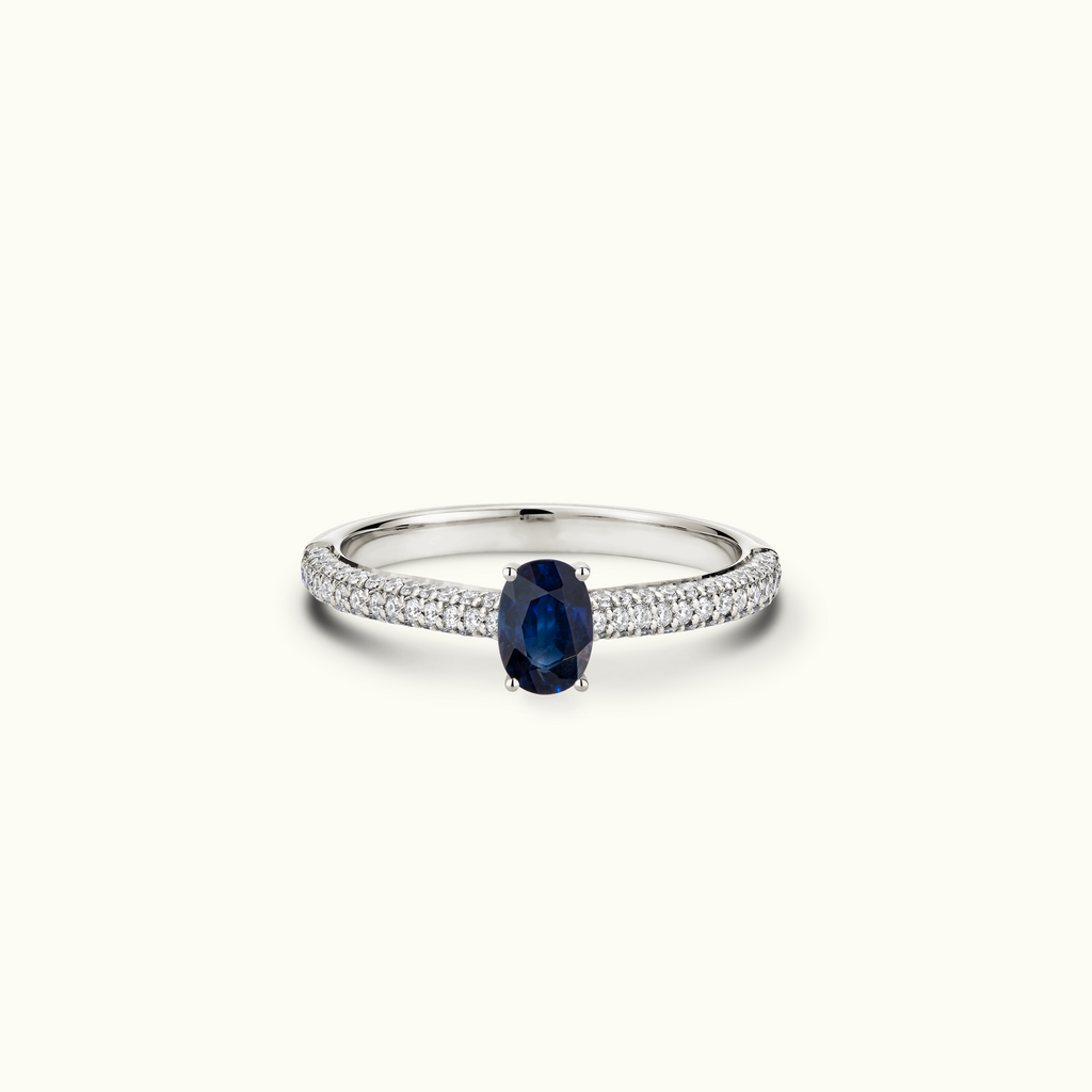 Jewellers District's Royal Sapphire Engagement Ring with Signature Knot-Basket and Micropavé Band in 14k White Gold, Oval