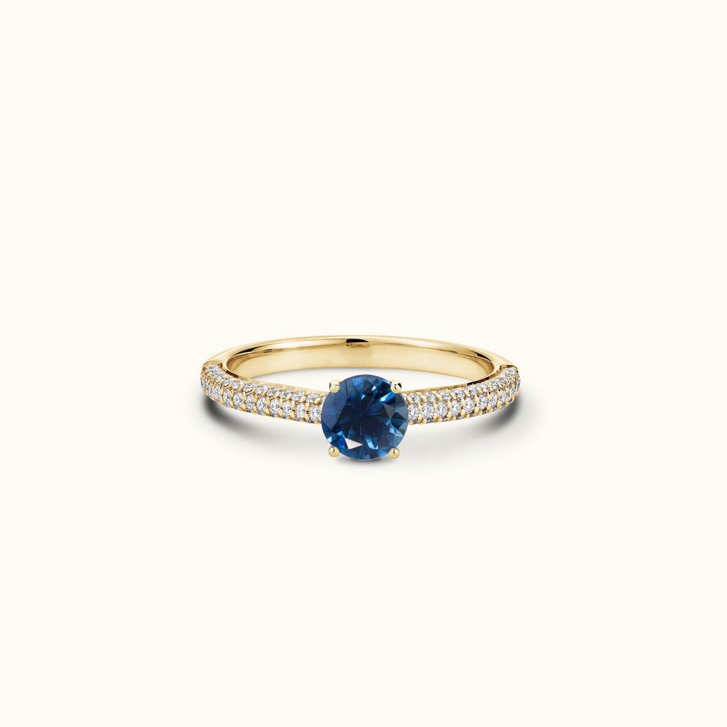 Jewellers District's Royal Sapphire Engagement Ring with Signature Knot-Basket and Micropavé Band in 14k Yellow Gold, Round