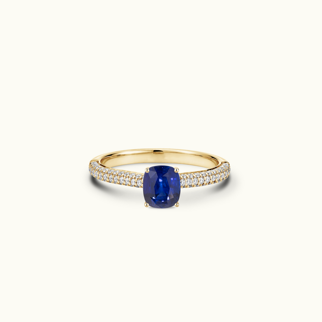 Jewellers District's Royal Sapphire Engagement Ring with Signature Knot-Basket and Micropavé Band in 14k Yellow Gold, Cushion