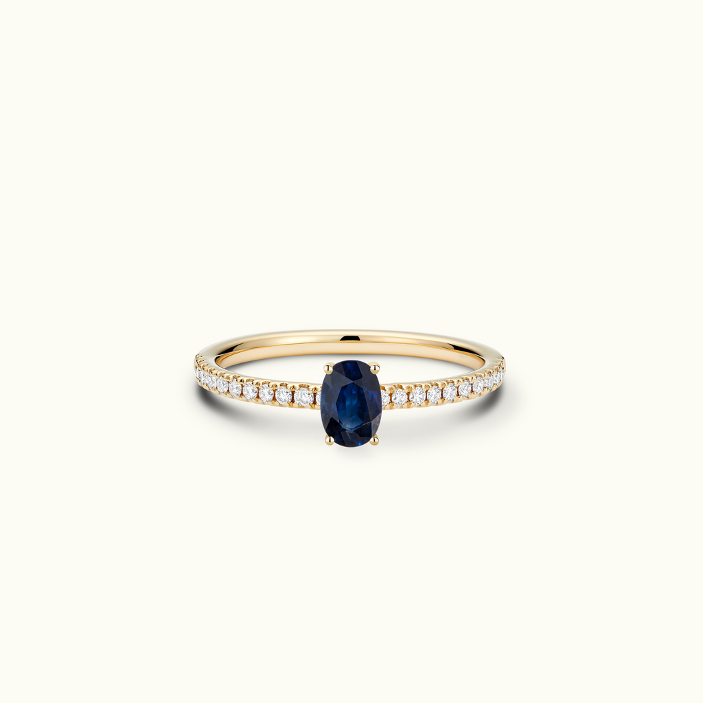 Jewellers District's Royal Sapphire Engagement Ring with Signature Knot-Basket and Diamond Band in 14k Yellow Gold, Oval