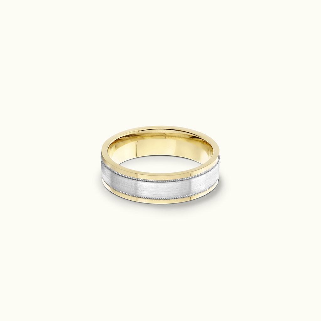 Face view of Jewellers District's Flat Two-Tone Beveled Wedding Ring in 14k Yellow Gold, Band: 5mm