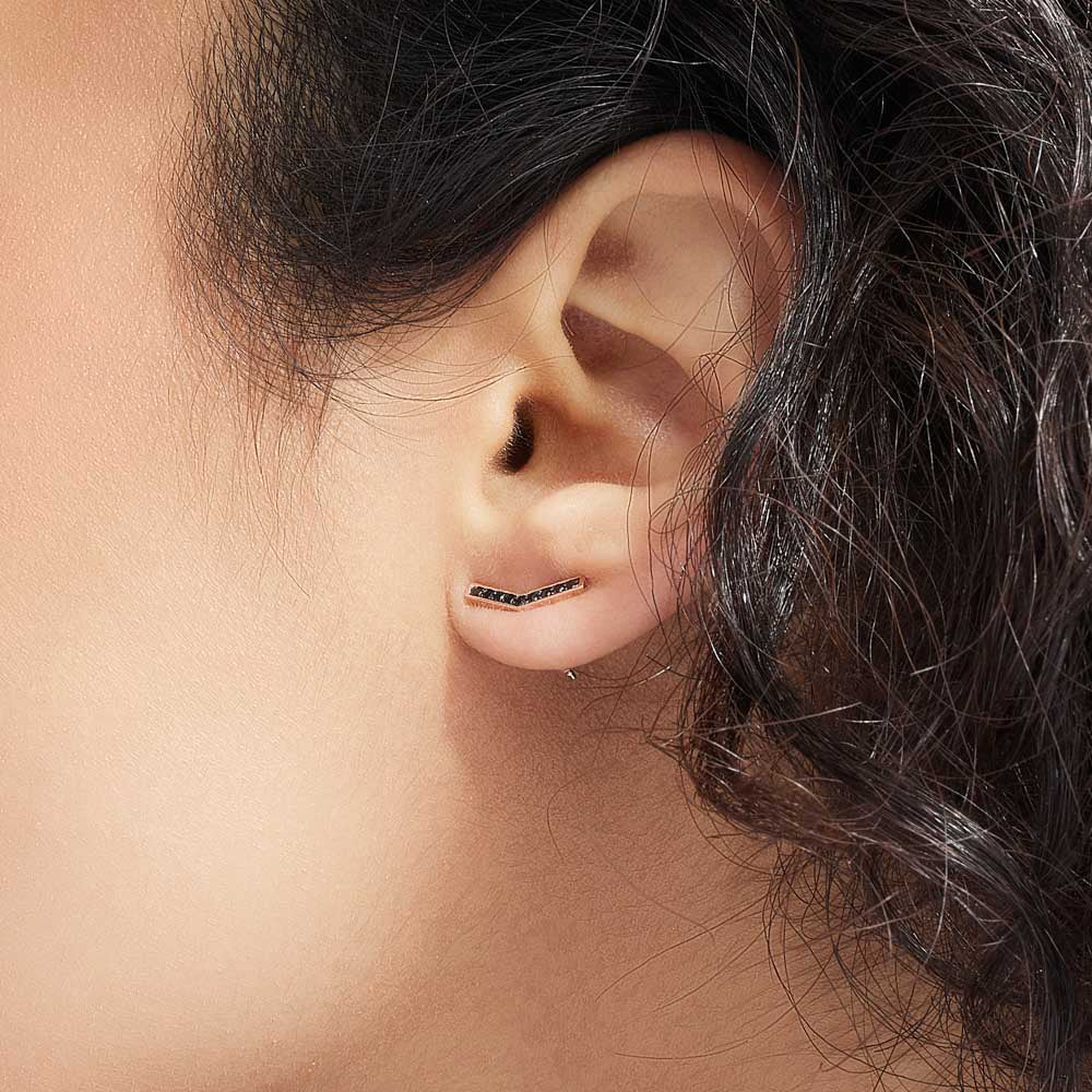 Model wearing Jewellers District's V-Shaped Stud Earrings with Accent Black Spinels in 14k Rose Gold #3