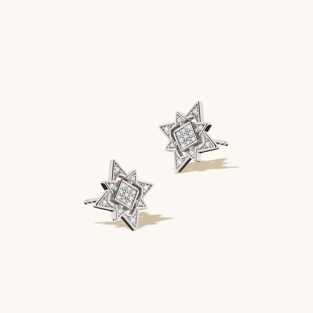 Angled view of Jewellers District's North Star Diamond Pavé Earrings in 10k White Gold