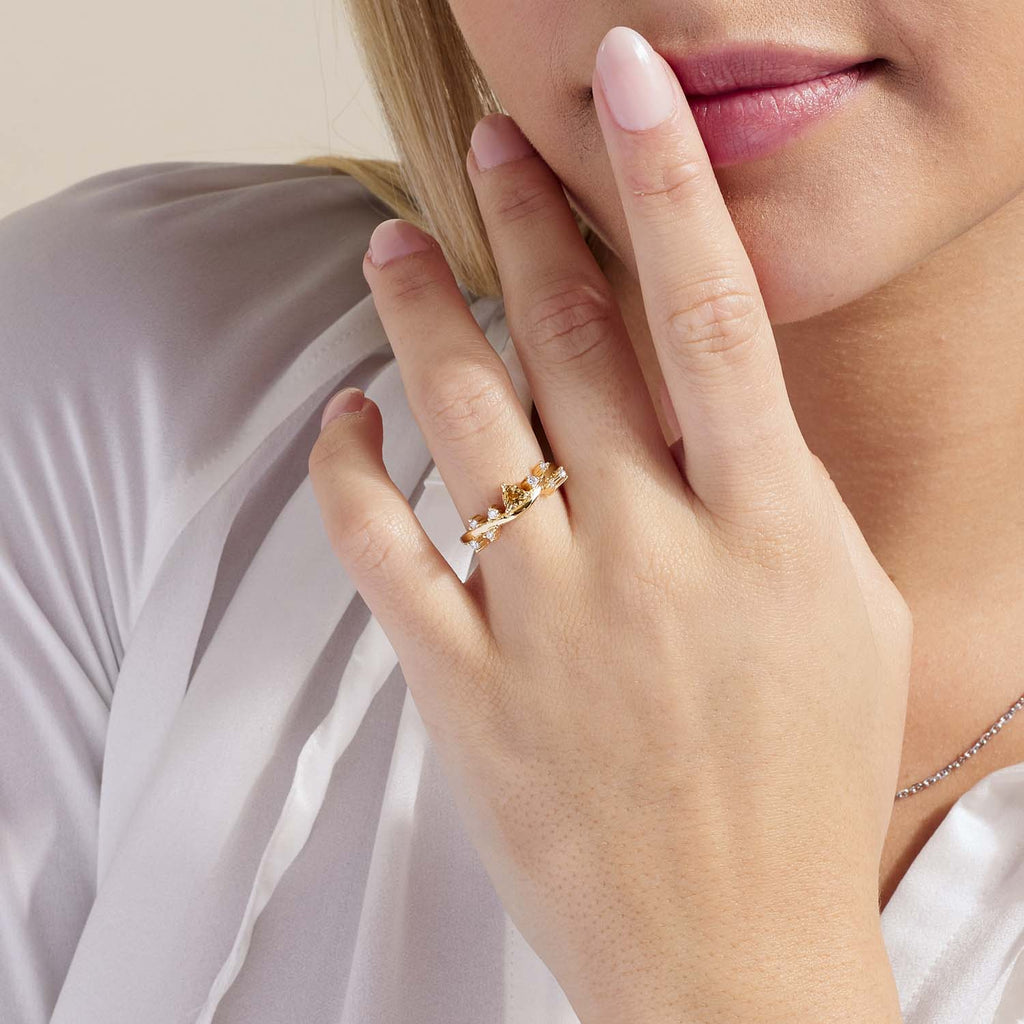 Model wearing Jewellers District's Cluster Imperial Topaz Ring with Accent Diamonds in 14k Yellow Gold