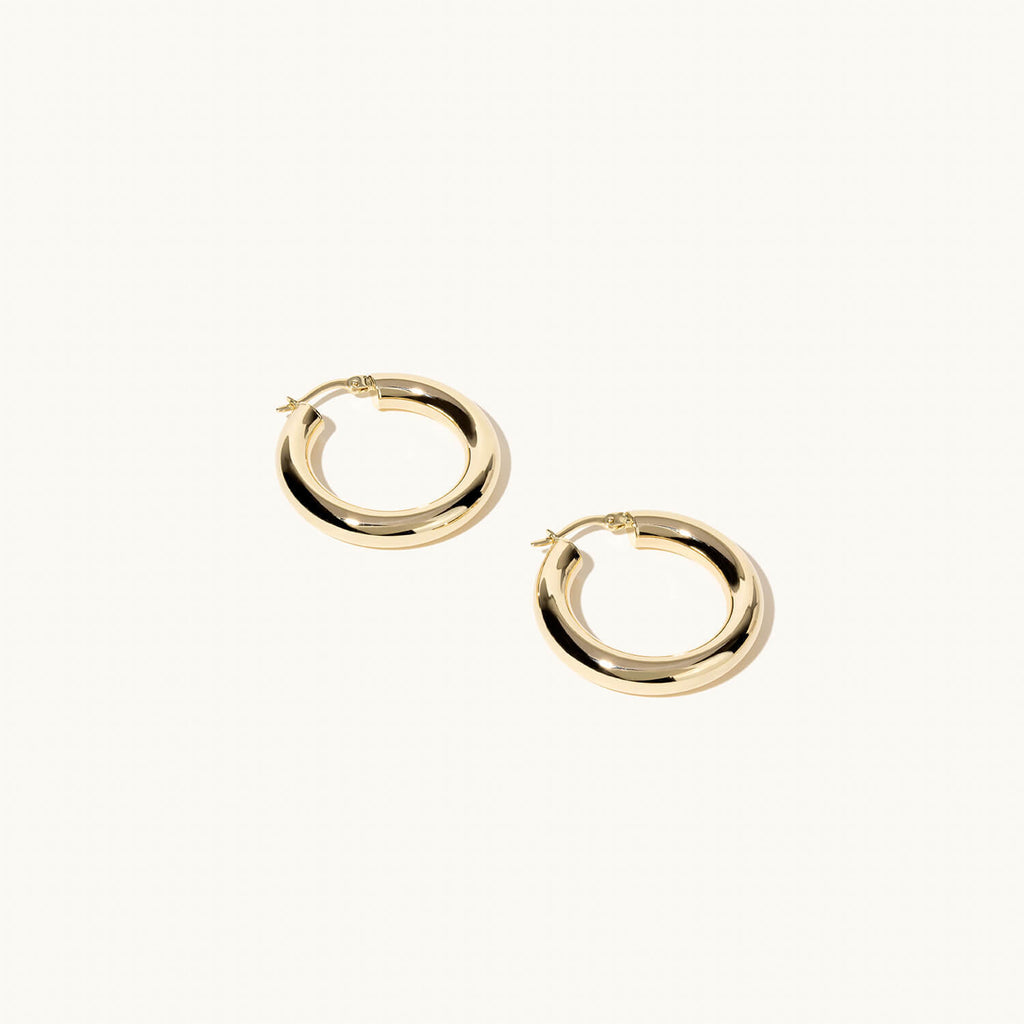 Profile view of Jewellers District's Bold Gold Hoop Earrings in 14k Yellow Gold