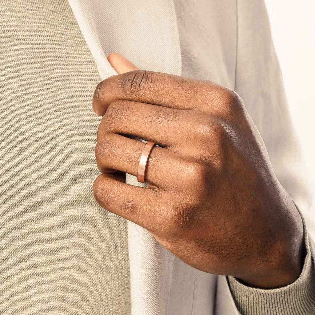 Model wearing Jewellers District's Flat Brushed Wedding Ring in 14k Rose Gold, Band: 5mm #2