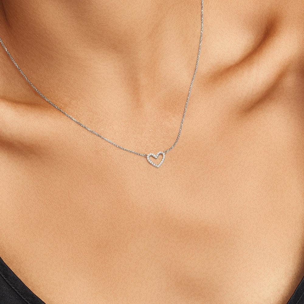 Model wearing Jewellers District's Heart Diamond Pavé Pendant Necklace in 10k White Gold #3