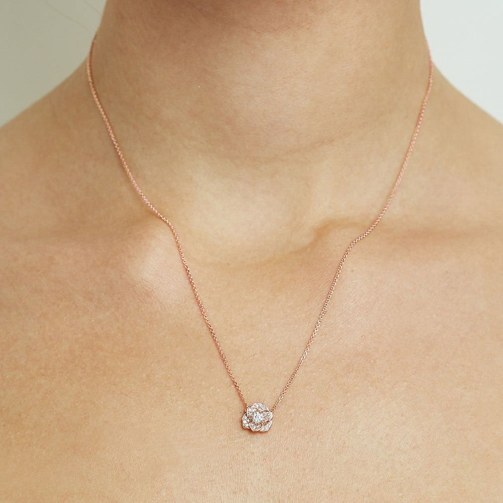 Model wearing Jewellers District's Flower Diamond Necklace with Diamond Pavé in 10k Rose Gold