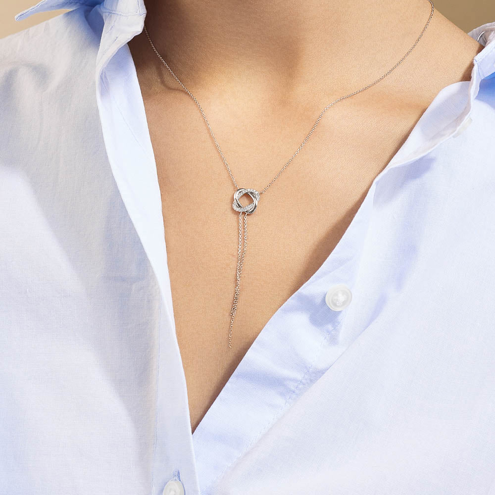 Model wearing Jewellers District's Twist Diamond Pavé Lariat Necklace in 10k White Gold #2