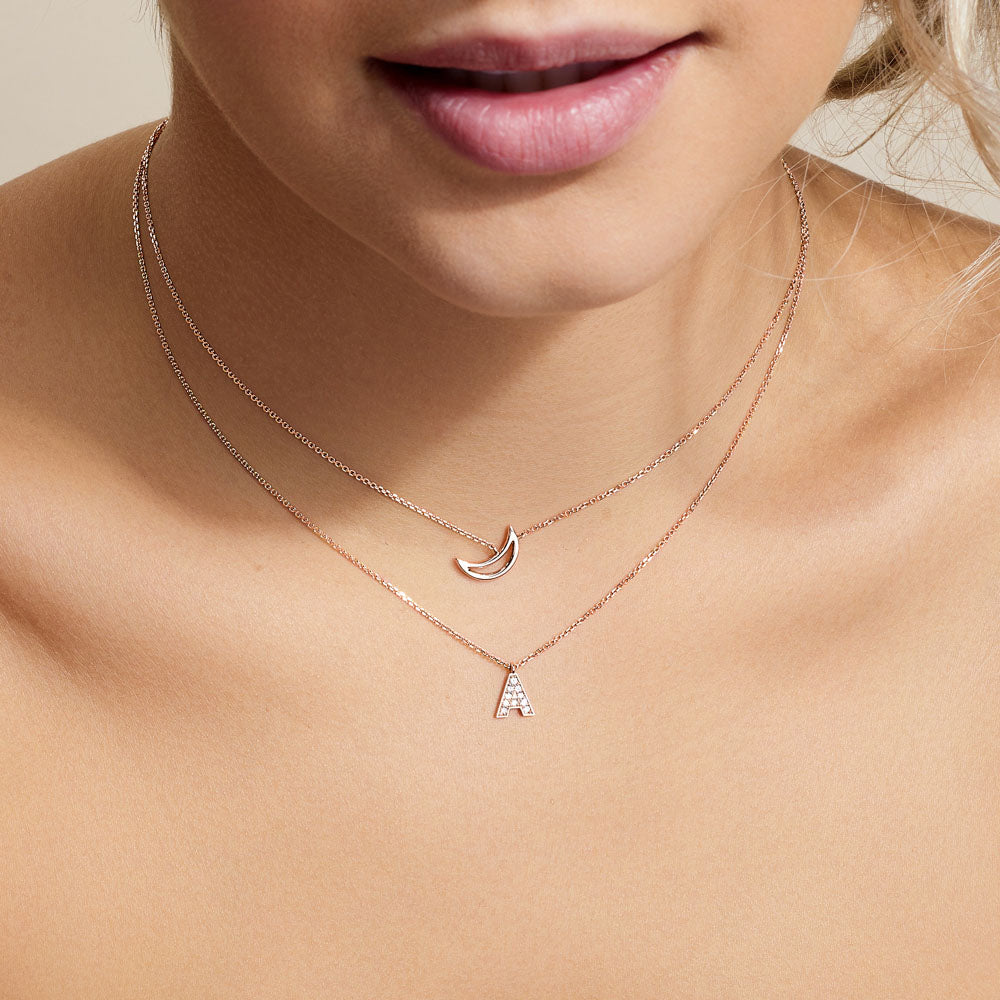 Model wearing Jewellers District's Initial Diamond Pavé Necklace : A in 14k Rose Gold #6