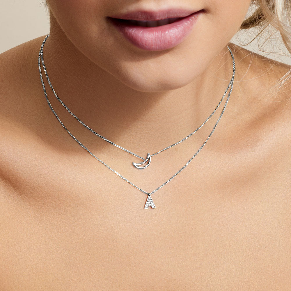 Model wearing Jewellers District's Initial Diamond Pavé Necklace : A in 14k White Gold #4