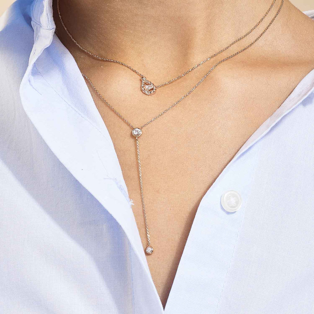 Model wearing Jewellers District's Bezel-Set Round Diamonds Lariat Necklace in 10k Rose Gold