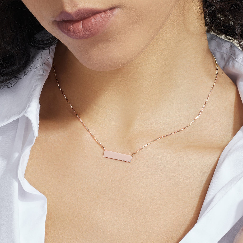 Model wearing Jewellers District's Gold Bar Pendant Necklace in 14k Rose Gold #2