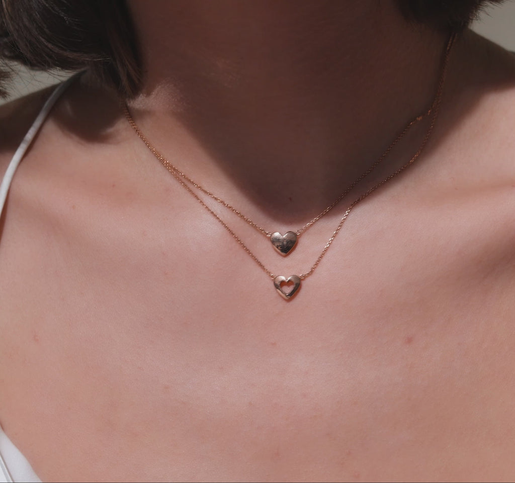 Video showcasing Jewellers District's Heart of Gold Pendant Necklace in 14k Rose Gold