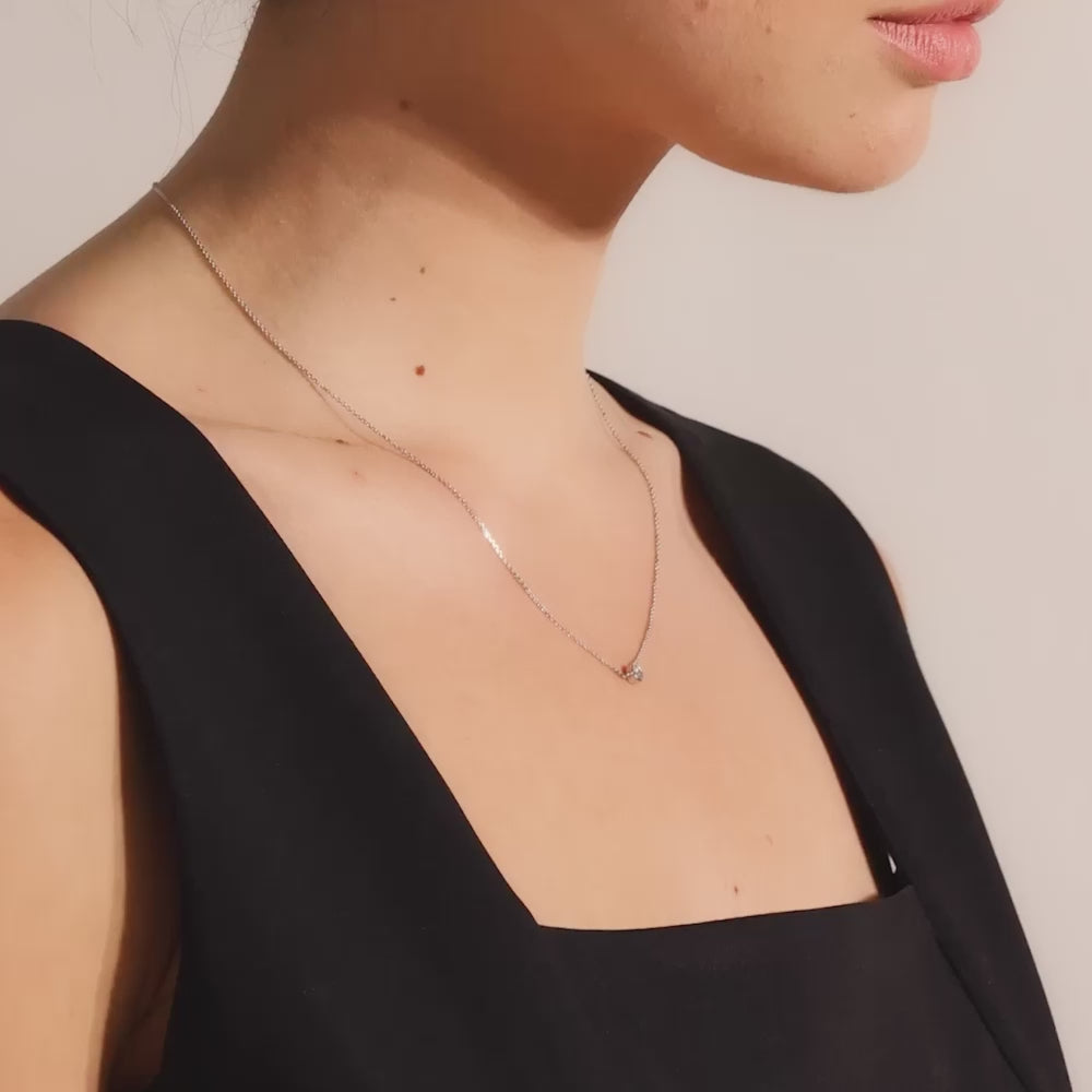 Video showcasing Jewellers District's Bezel-Set Solitaire Diamond Necklace in 14k Yellow Gold